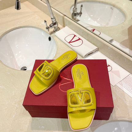 VALENTINO 26S SLIDES IN YELLOW CALFSKIN WITH LOGO