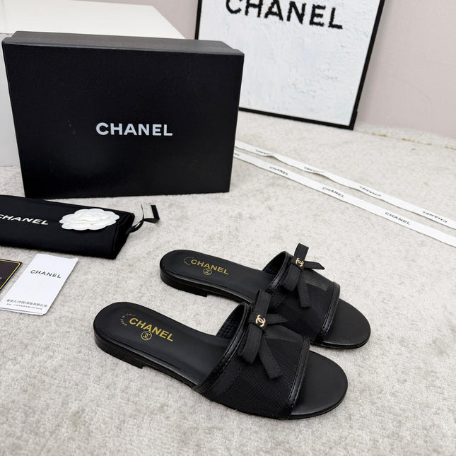 CHANEL 26S SLIDE SANDALS IN BLACK MESH AND CALFSKIN WITH RIBBON
