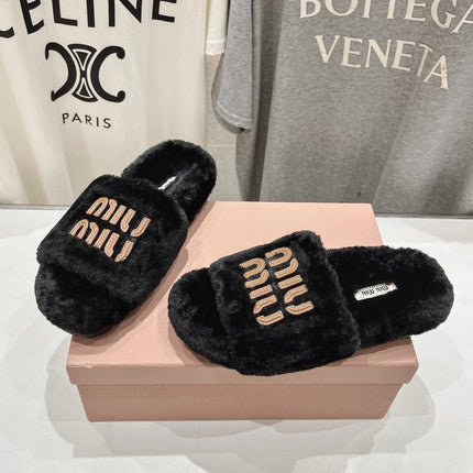 MIUMIU 26S FLAT SLIDES IN BLACK SHEARLING