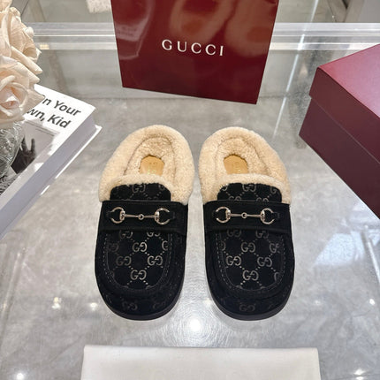 GUCCI 26S MULES IN BLACK SUEDE GG LOGO PATTERN