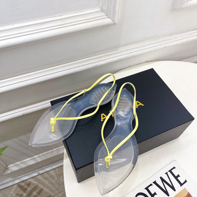 ALAIA 26S POINTED-TOE THONG SANDALS IN YELLOW AND TRANSPARENT PVC