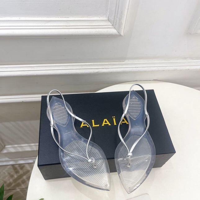 ALAIA 26S POINTED-TOE THONG SANDALS IN SILVER AND TRANSPARENT PVC
