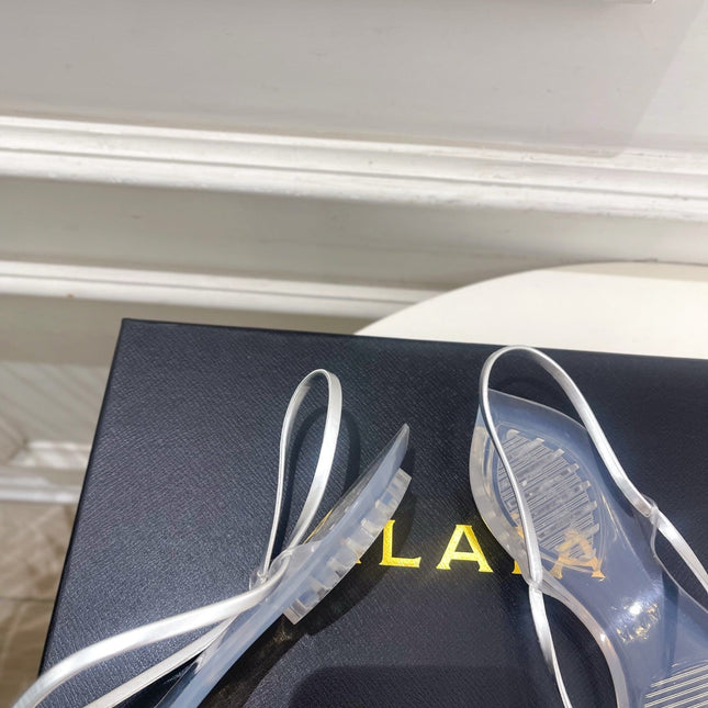 ALAIA 26S POINTED-TOE THONG SANDALS IN SILVER AND TRANSPARENT PVC
