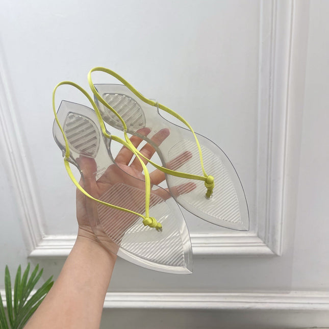 ALAIA 26S POINTED-TOE THONG SANDALS IN LIGHT YELLOW SATIN AND TRANSPARENT PVC