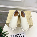 THE ROW 26S SLIP-ON FLATS IN WHITE NAPPA CALFSKIN