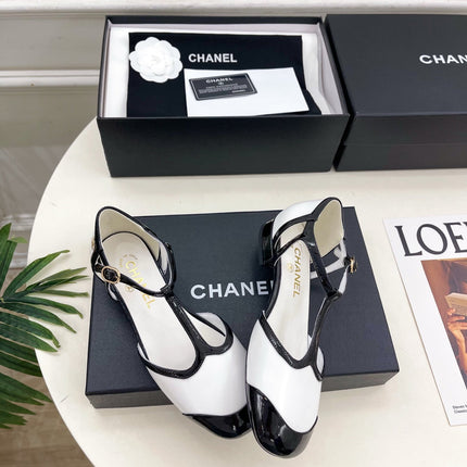 CHANEL 26S T STRAP MARY JANES IN WHITE LAMBSKIN