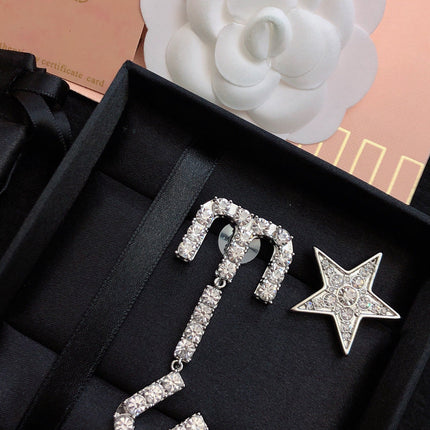 MIUMIU 26S CRYSTAL LOGO DROP EARRING AND STAR STUD EARRING SET IN SILVER TONE METAL 630843