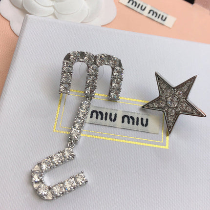 MIUMIU 26S CRYSTAL LOGO DROP EARRING AND STAR STUD EARRING SET IN SILVER TONE METAL 630843
