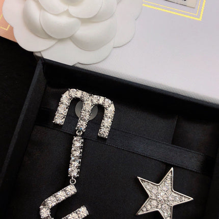 MIUMIU 26S CRYSTAL LOGO DROP EARRING AND STAR STUD EARRING SET IN SILVER TONE METAL 630843