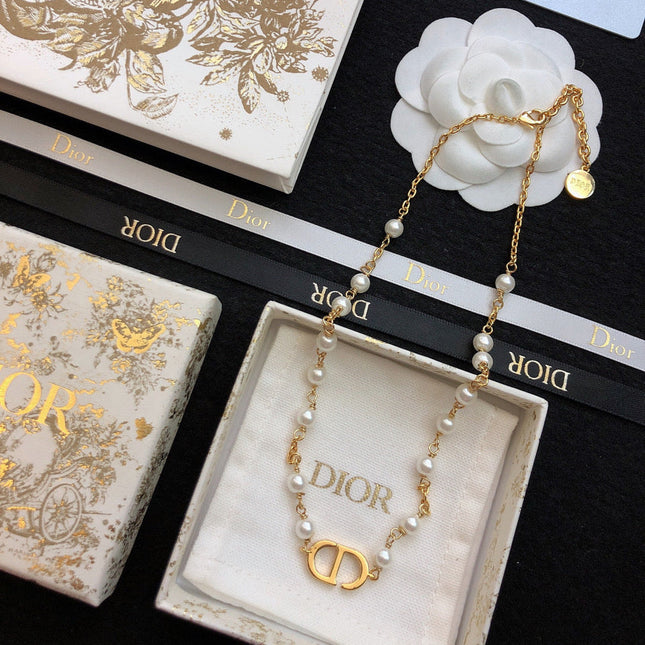 CD 26S CD LOGO PEARL CHAIN NECKLACE IN GOLD TONE METAL WITH WHITE PEARL 631005