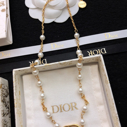 CD 26S CD LOGO PEARL CHAIN NECKLACE IN GOLD TONE METAL WITH WHITE PEARL 631005
