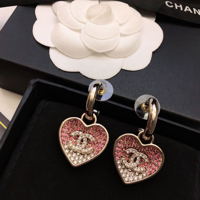 CHANEL 26S DOUBLE C LOGO TWO-TONE PAVE CRYSTAL HEART DROP HOOP EARRINGS IN GOLD METAL 631080