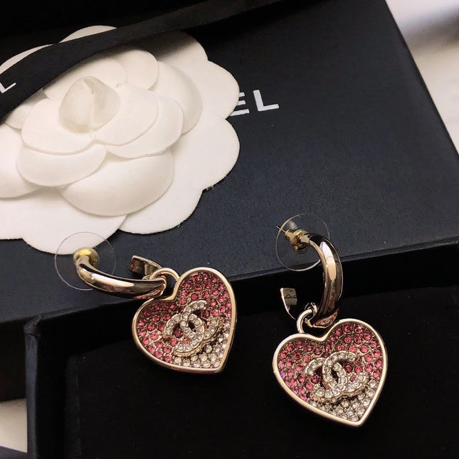 CHANEL 26S DOUBLE C LOGO TWO-TONE PAVE CRYSTAL HEART DROP HOOP EARRINGS IN GOLD METAL 631080