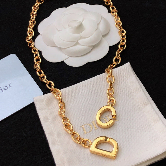 CD 26S CD LOGO CHUNKY CHAIN NECKLACE IN GOLD TONE METAL 631003