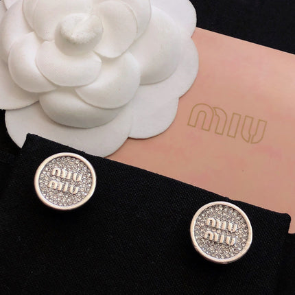 MIUMIU 26S CRYSTAL MIU LOGO ROUND STUD EARRINGS IN SILVER TONE METAL 630845