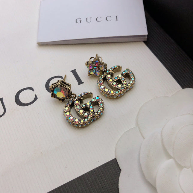 GUCCI 26S DOUBLE G LOGO MULTICOLOR CRYSTAL DROP STATEMENT EARRINGS IN AGED GOLD TONE METAL 629027