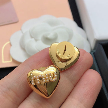 MIUMIU 26S PEARL LOGO HEART STUD EARRINGS IN GOLD TONE METAL 612685