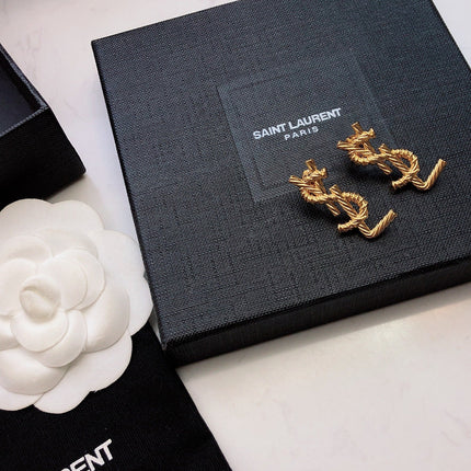 YSL 26S TWISTED ROPE LOGO STUD EARRINGS IN GOLD TONE METAL 629135