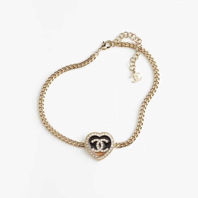 CHANEL 26S DOUBLE C LOGO PAVE CRYSTAL HEART CHAIN BRACELET IN GOLD METAL 633321