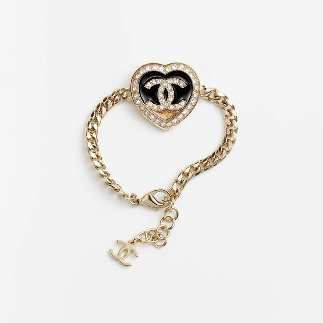 CHANEL 26S DOUBLE C LOGO PAVE CRYSTAL HEART CHAIN BRACELET IN GOLD METAL 633321