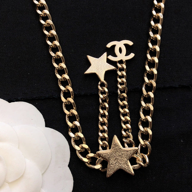 CHANEL 26S CHANEL CC LOGO DOUBLE CHAIN STAR DROP NECKLACE IN GOLD METAL 633324