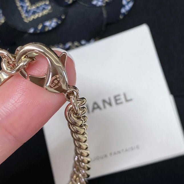 CHANEL 26S CHANEL CC LOGO DOUBLE CHAIN STAR DROP NECKLACE IN GOLD METAL 633324