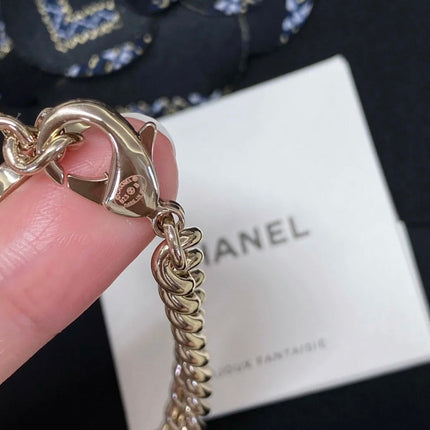 CHANEL 26S CHANEL CC LOGO DOUBLE CHAIN STAR DROP NECKLACE IN GOLD METAL 633324