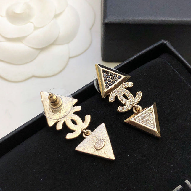 CHANEL 26S DOUBLE C LOGO TWO-TONE CRYSTAL TRIANGLE DROP EARRINGS IN GOLD METAL 631834